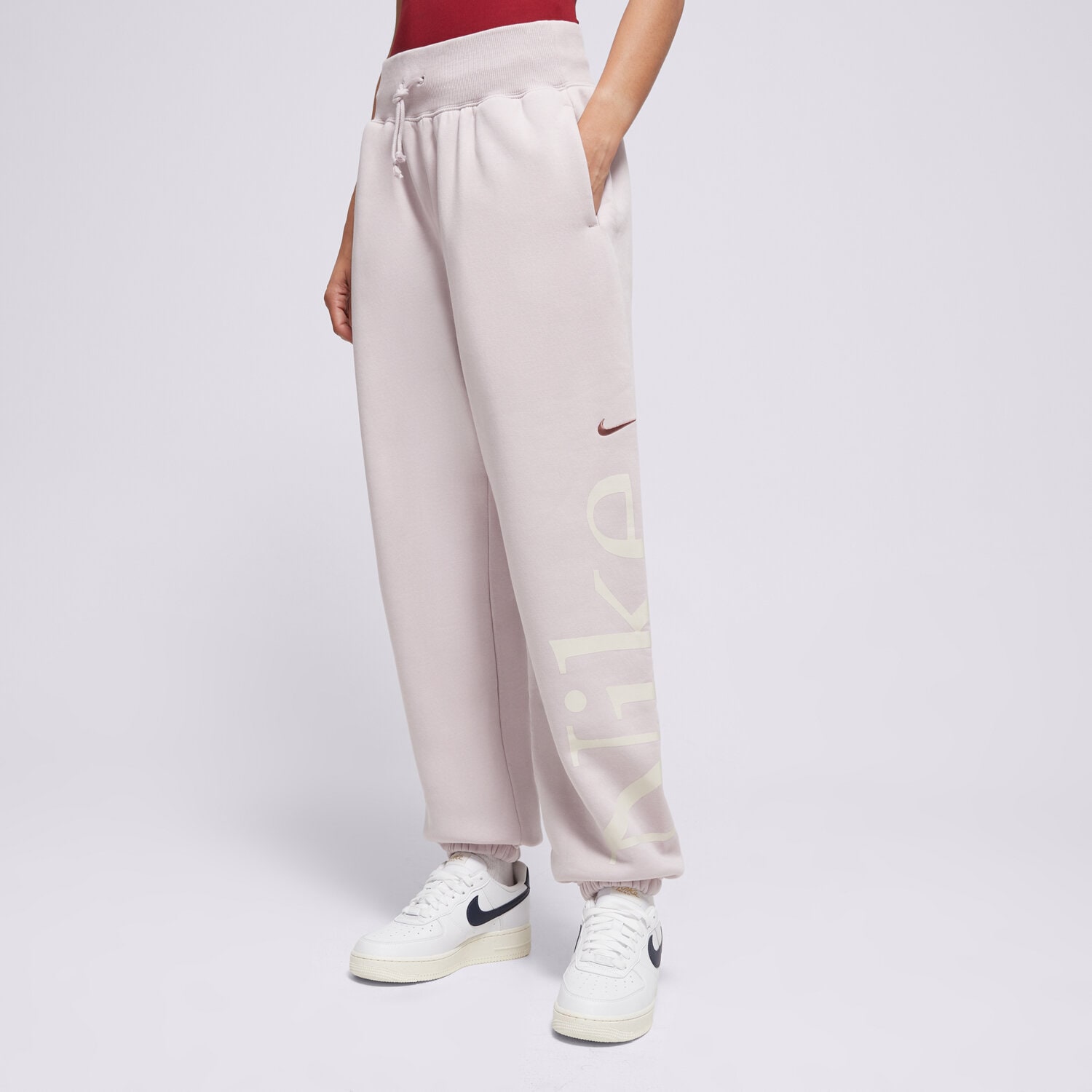 Ženske hlače NIKE HLAČE W NSW PHNX FLC OS LOGO SWTPNT FN2552-019 ljubičasta