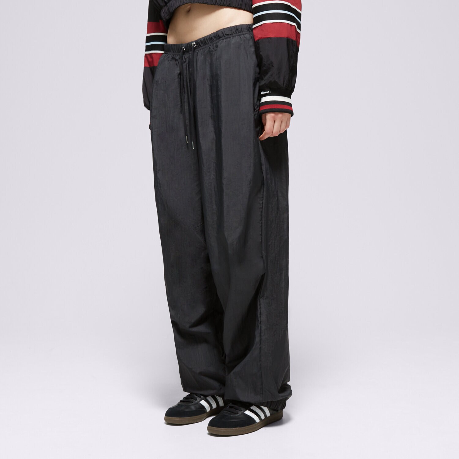 Ženske hlače ADIDAS HLAČE NYLON PS PANT IT6725 crna