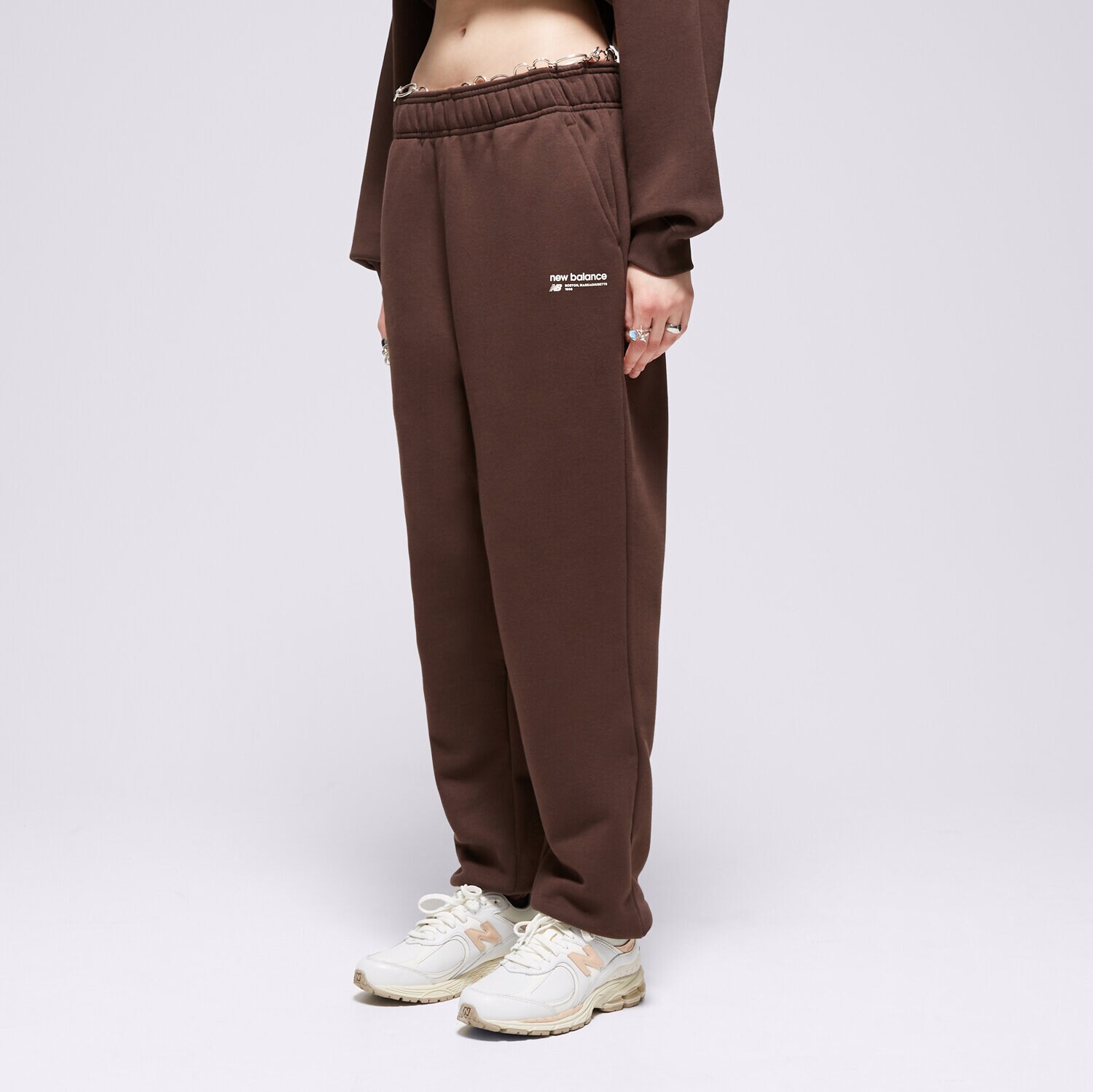 Ženske hlače NEW BALANCE HLAČE LINEAR HERITAGE BRUSHED BACK WP33513KCF smeđa