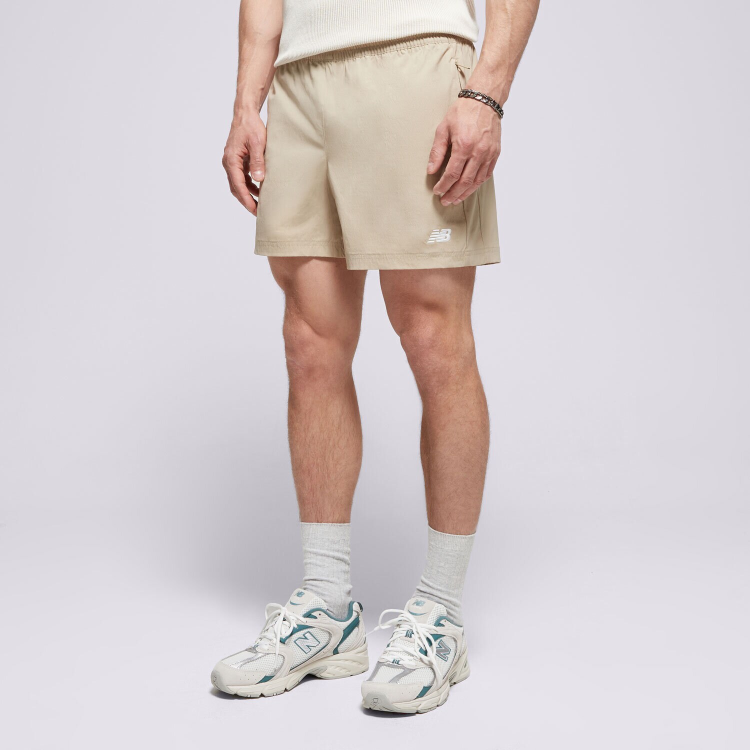 Muške kratke hlače NEW BALANCE KRATKE HLAČE ATHLETICS   STRETCH WOVEN SHORT MS41517SOT bež