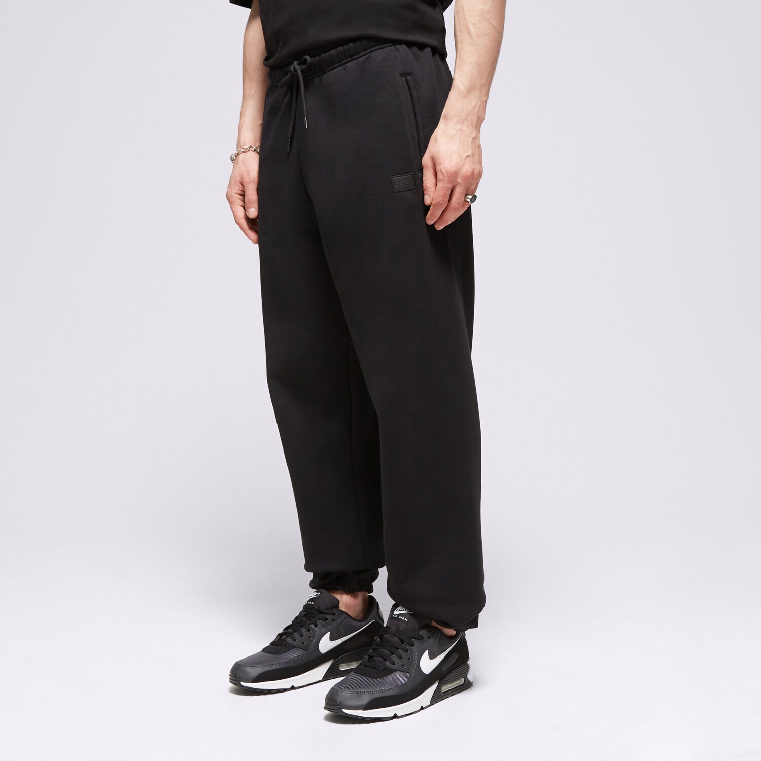 Muške hlače ALPHA INDUSTRIES HLAČE ALPHA ESSENTIALS RL JOGGER 14636403 crna