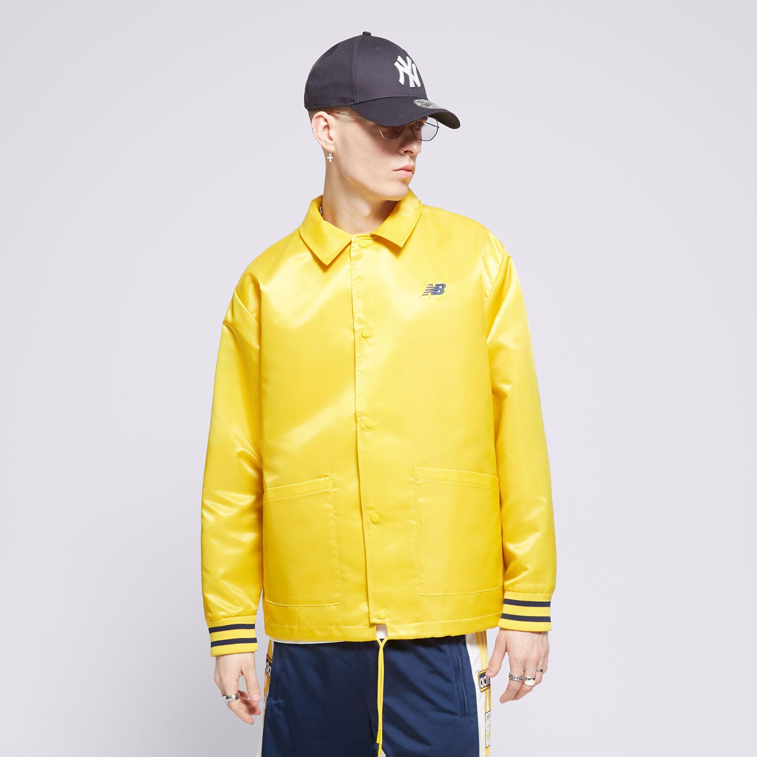 Muške prijelazne jakne NEW BALANCE JAKNA SGH COACHES JACKET MJ41553GGL žuta