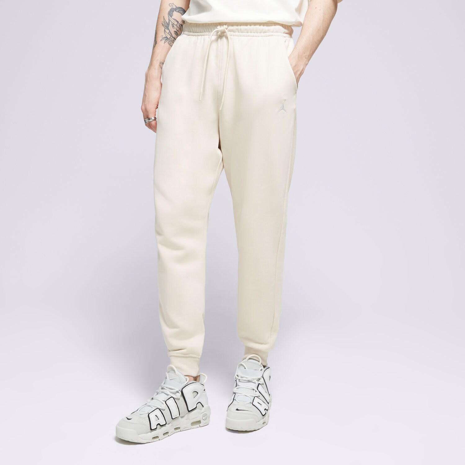 Muške hlače HLAČE M JORDAN ESS FLC PANT LB FQ7761-203 bež