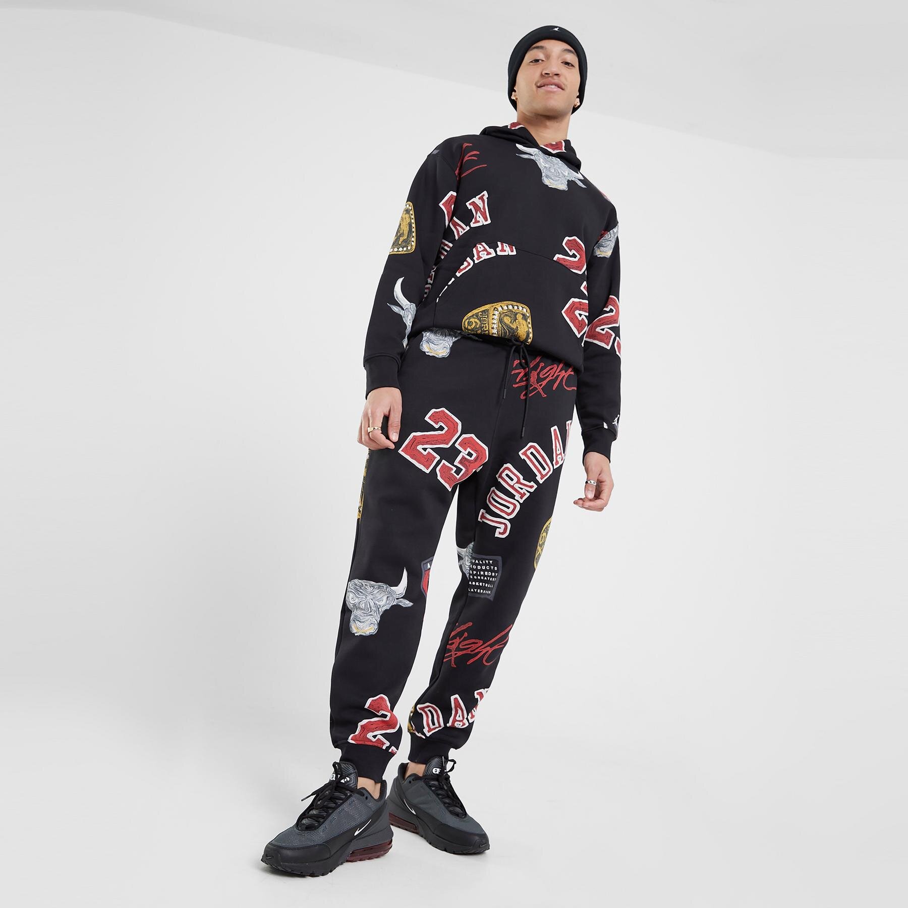 Muške hlače JORDAN HLAČE M J ESS AOP FLC PANT FN4547-010 šarena