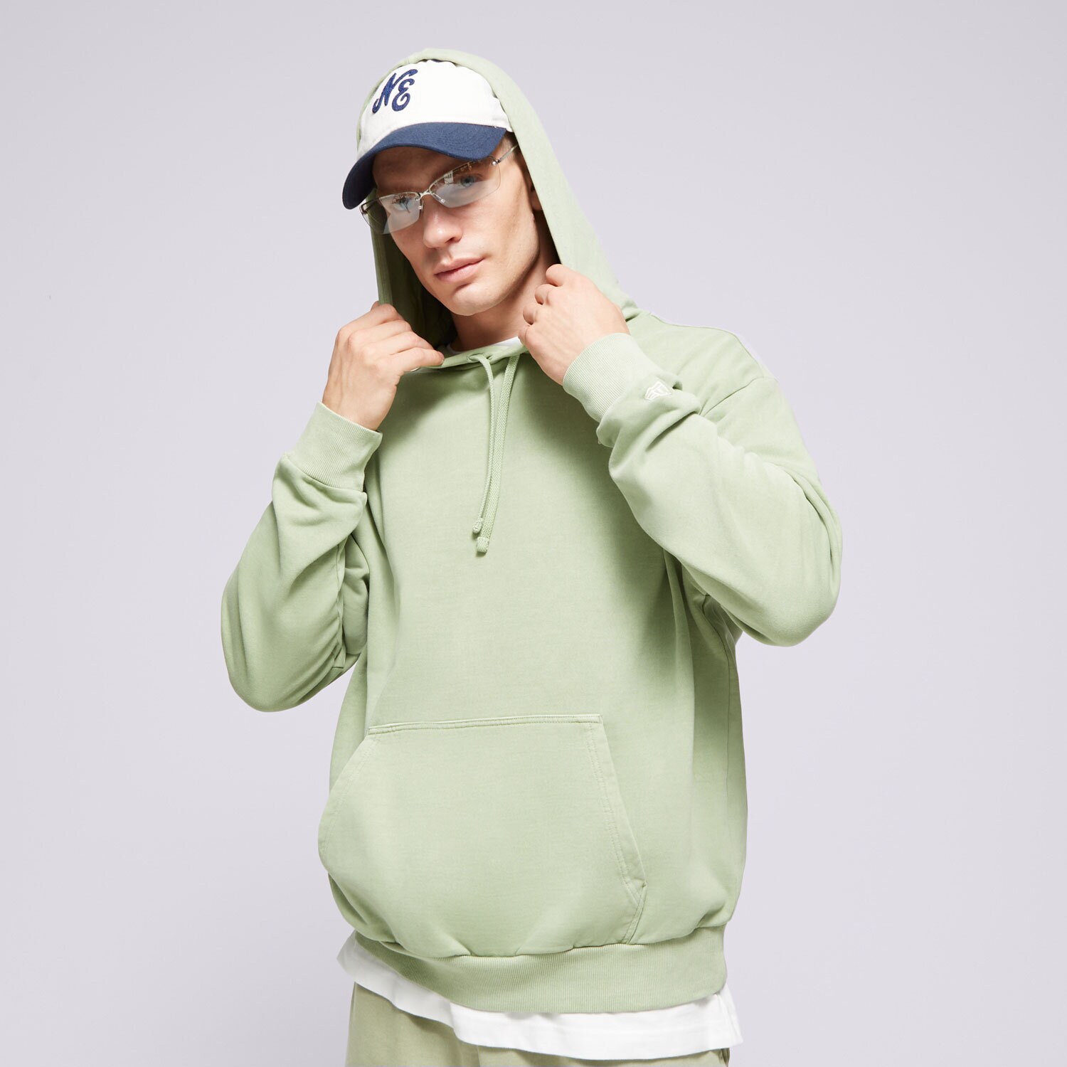 Muške dukserice NEW ERA VESTA S KAPULJAČOM NE WASHED OVERSIZED NONE 60502671 zelena
