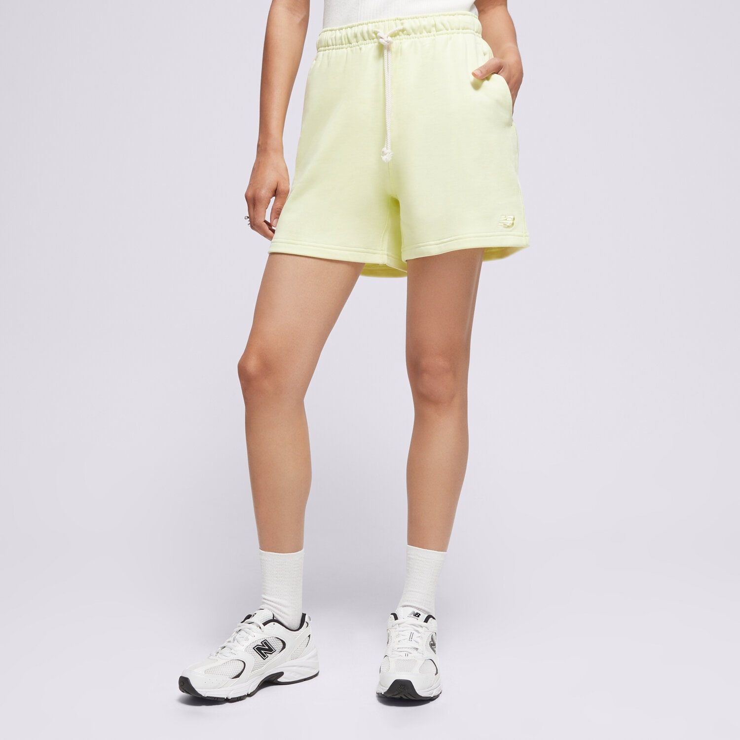 Ženske kratke hlače NEW BALANCE KRATKE HLAČE ATHLETICS FRENCH TERRY WS41508LLT žuta