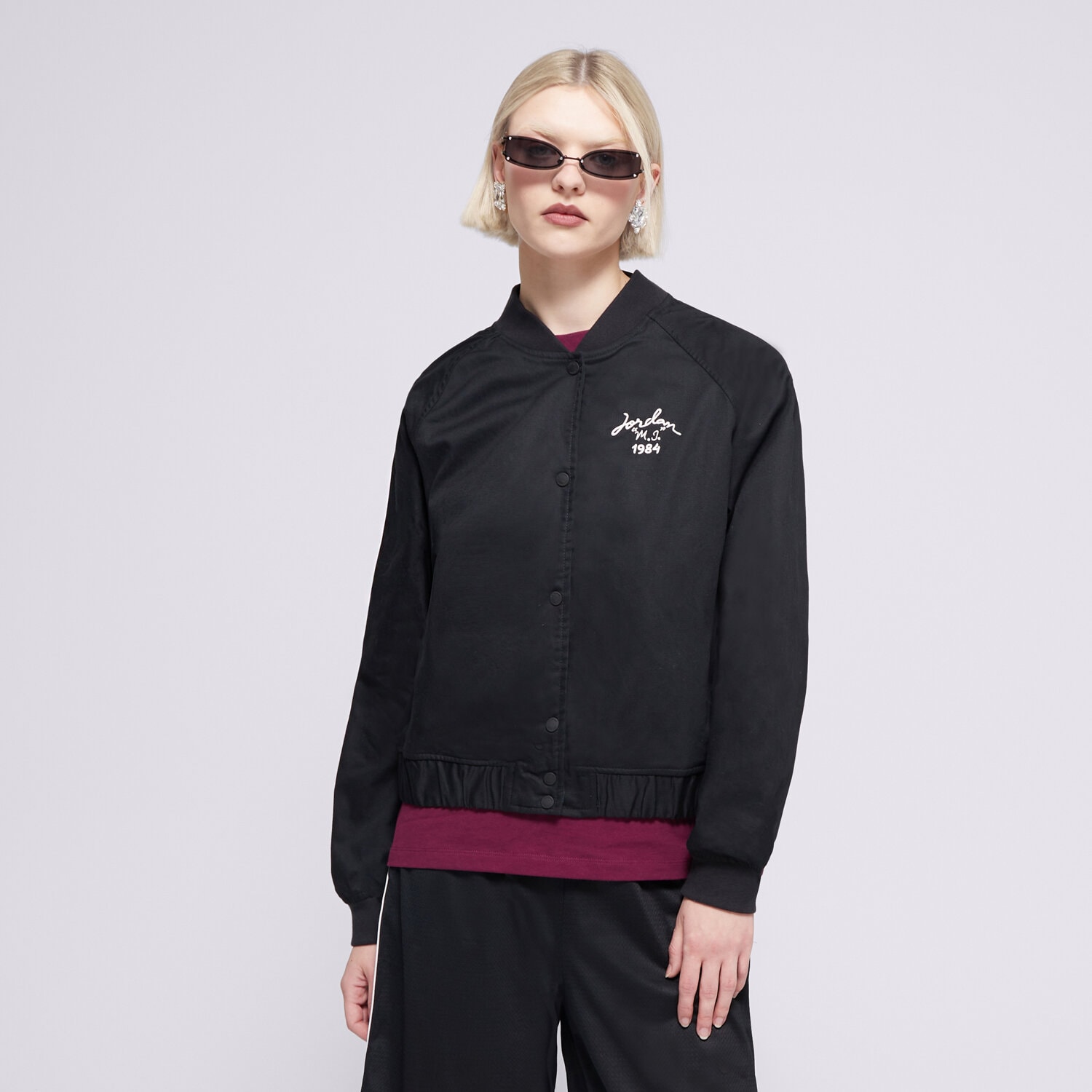 Ženske prijelazne jakne JAKNA PRIJELAZNA W JORDAN VARSITY JKT SSNL C  FN5786-010 crna