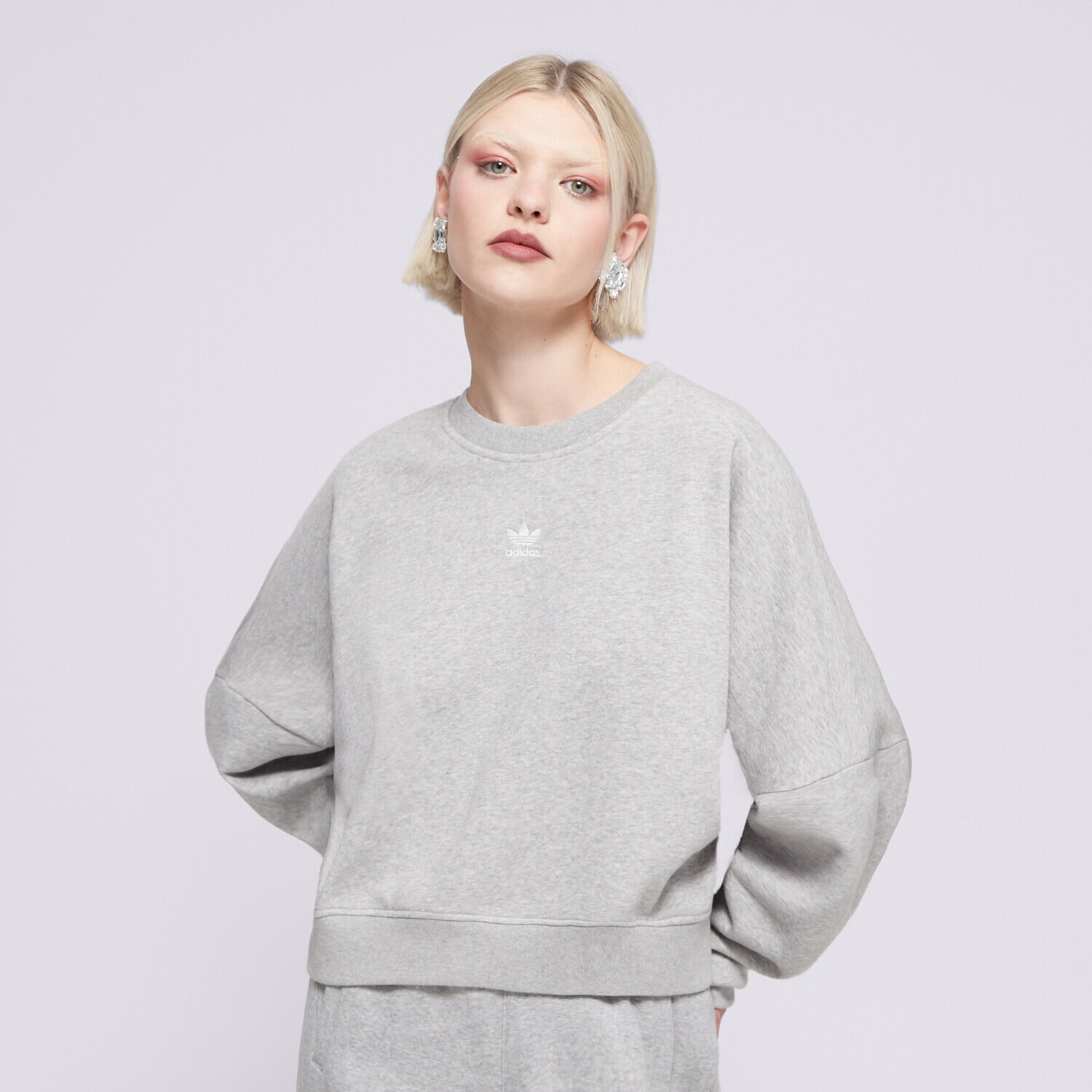 Ženske dukserice ADIDAS VESTA ESS CREW FL IY2545 siva