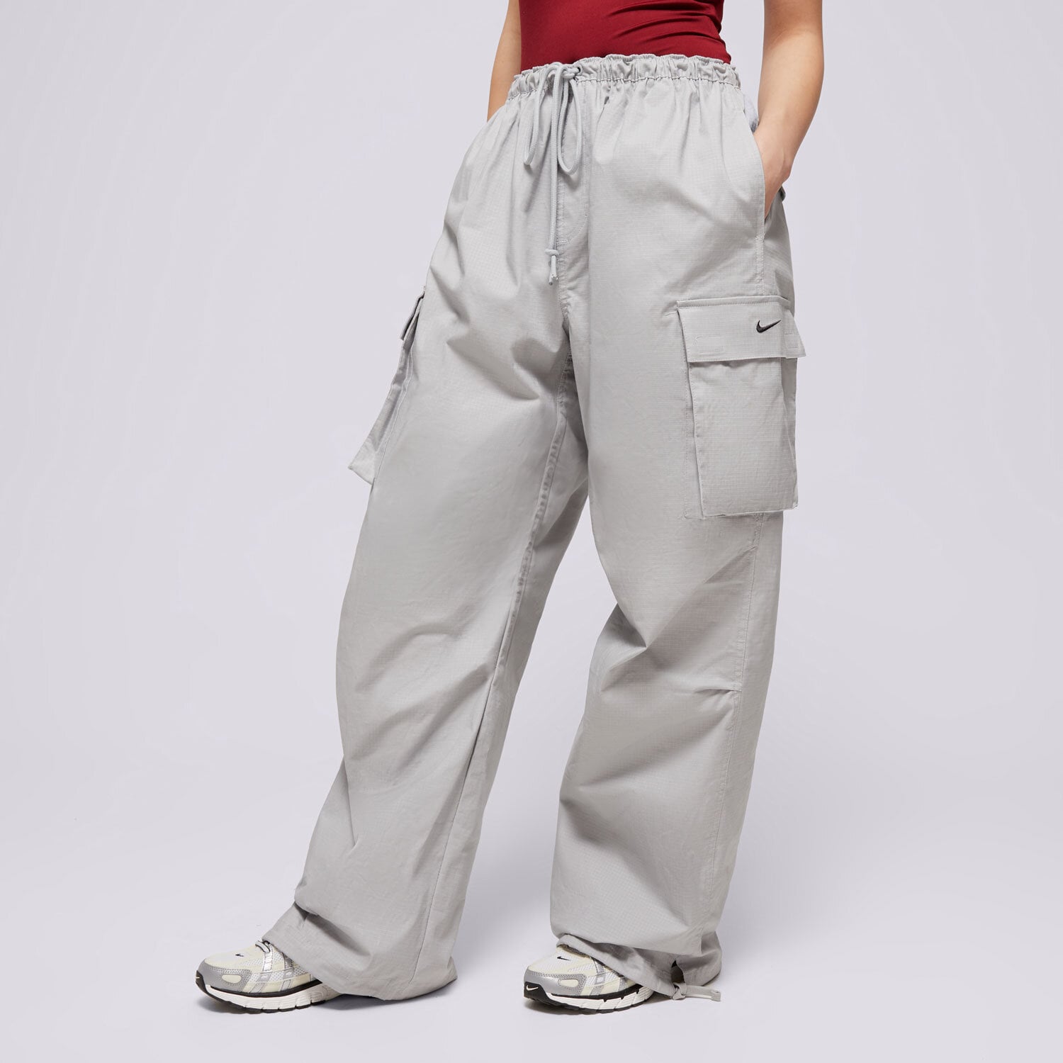 Ženske hlače NIKE HLAČE W NSW DANCE CARGO PANT FV7520-077 siva