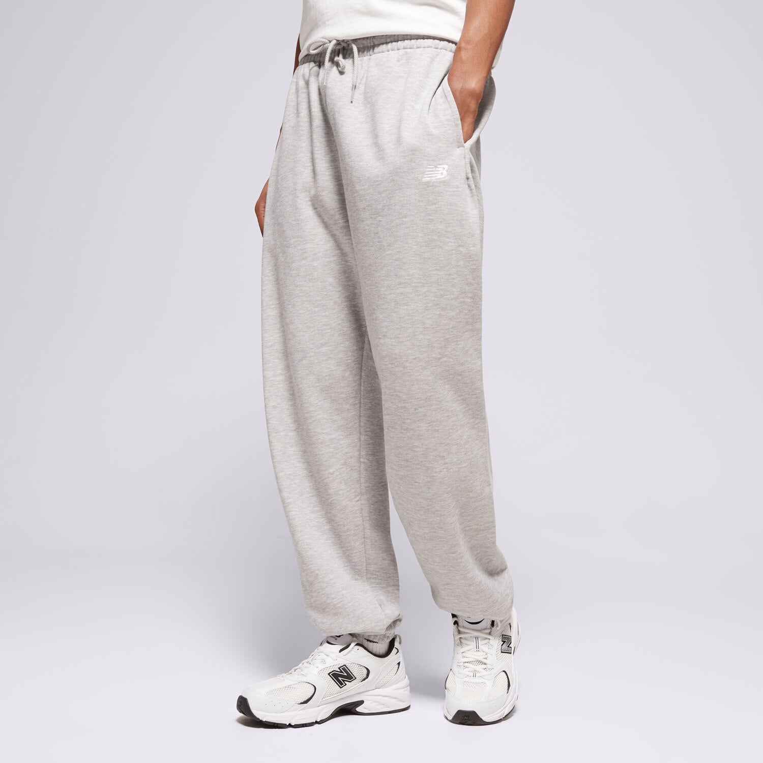 Muške hlače NEW BALANCE HLAČE SPORT ESSENTIALS FRENCH TERRY JOGGER MP41519AG siva