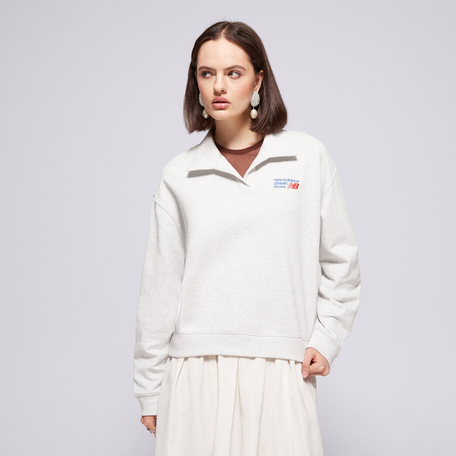 Ženske dukserice NEW BALANCE VESTA FRENCH TERRY POLO WT51513AHH siva