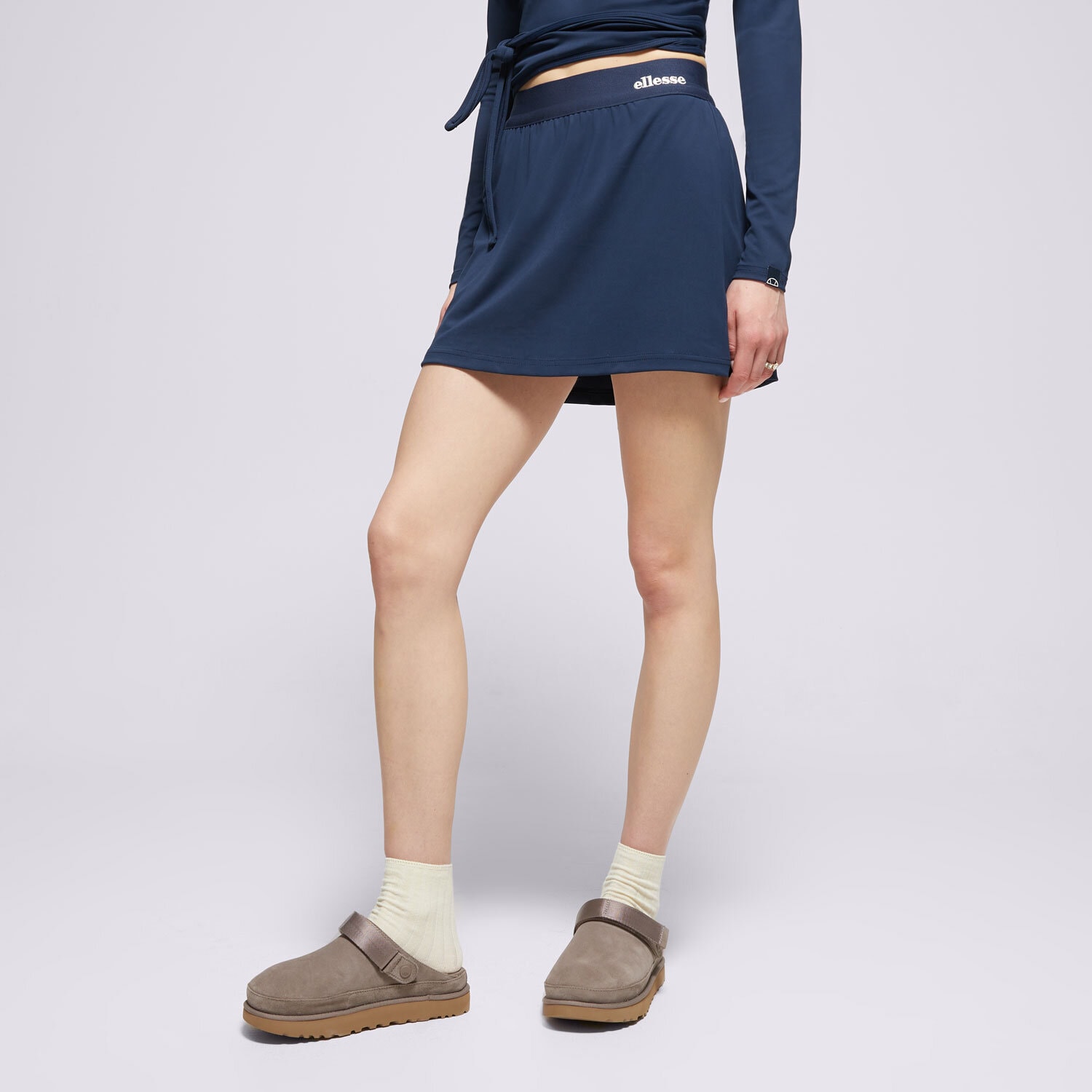 Ženske haljine i suknje ELLESSE KRATKA SUKNJA HEDERA SKIRT NAVY SGZ22012429 tamno plava