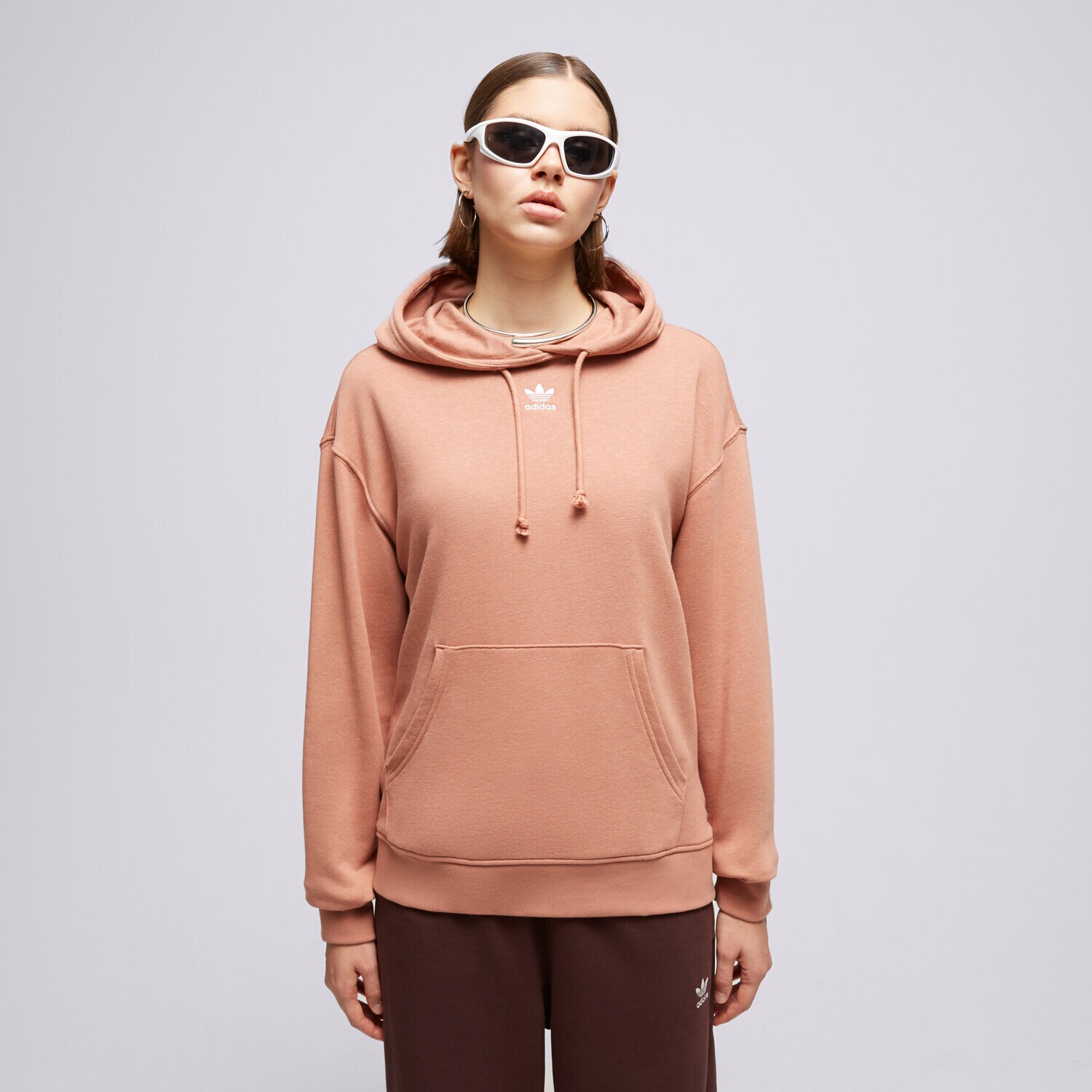 Ženske dukserice ADIDAS VESTA S KAPULJAČOM ESS+ HOODIE IC1810 ružičasta