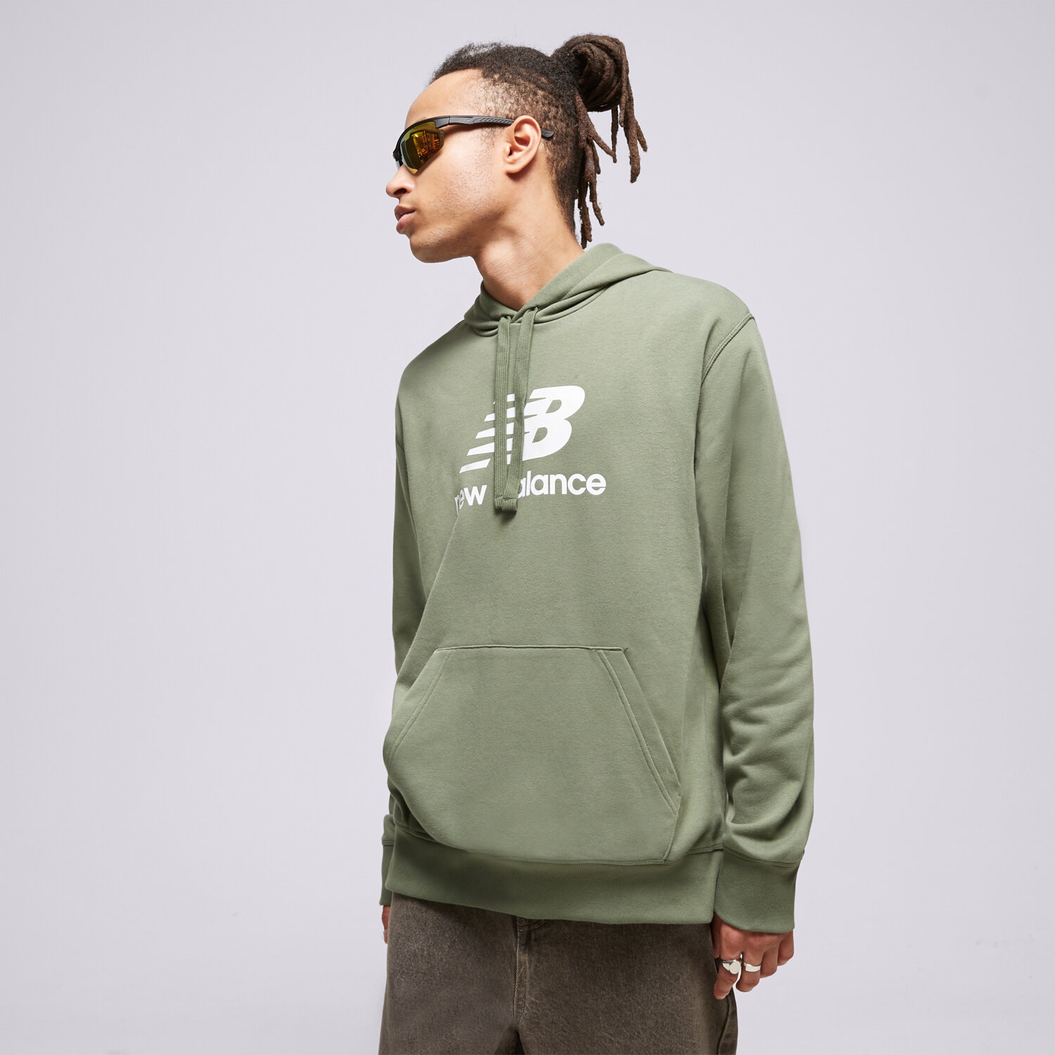 Muške dukserice NEW BALANCE VESTA S KAPULJAČOM ESSENTIALS STACKED MT31537DON zelena