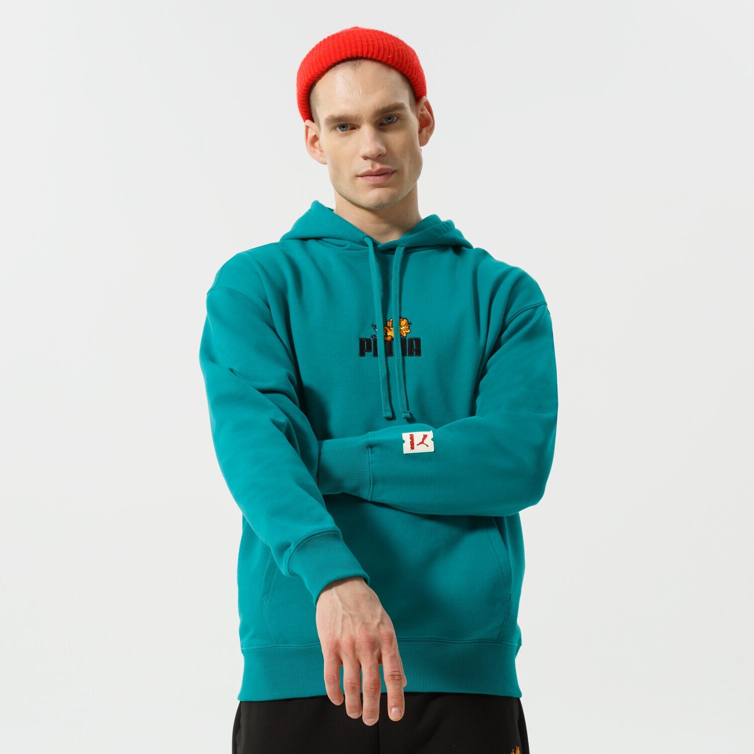 Muške dukserice PUMA VESTA S KAPULJAČOM PUMA X GARFIELD HOODIE 534435 86 zelena