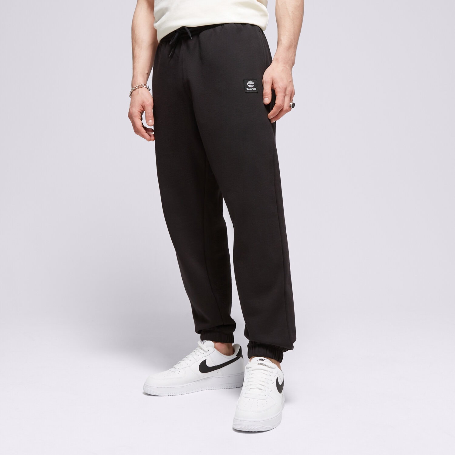 Muške hlače TIMBERLAND HLAČE NEW WOVEN BADGE SWEATPANT