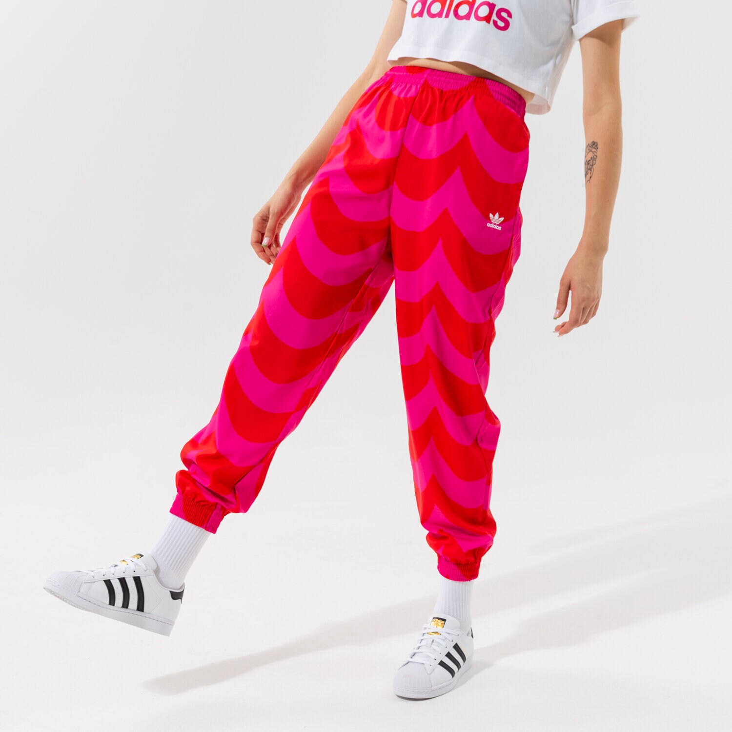 Ženske hlače ADIDAS HLAČE TRACK PANT H20480 crvena