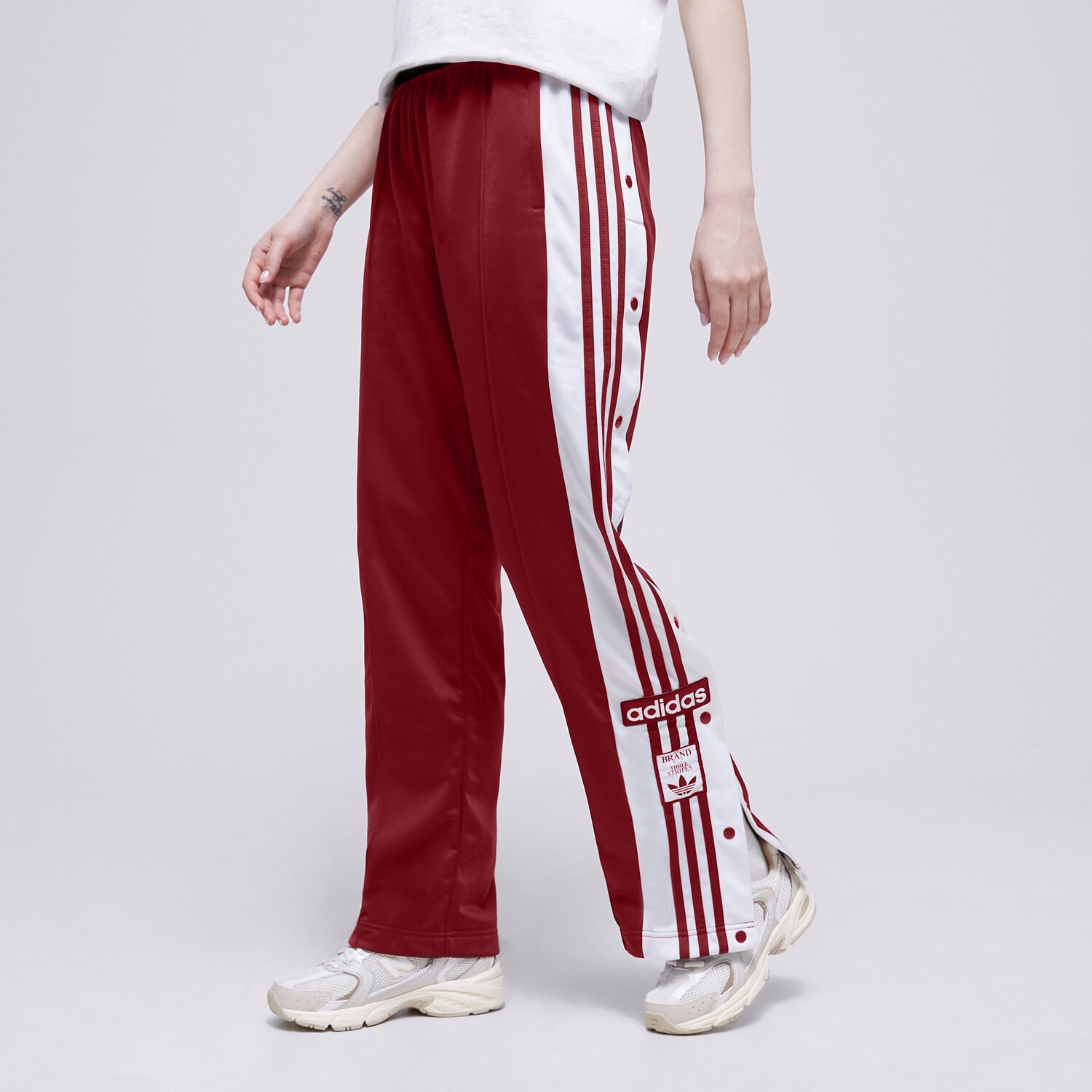 Ženske hlače ADIDAS HLAČE ADIBREAK TP IB7297 crvena