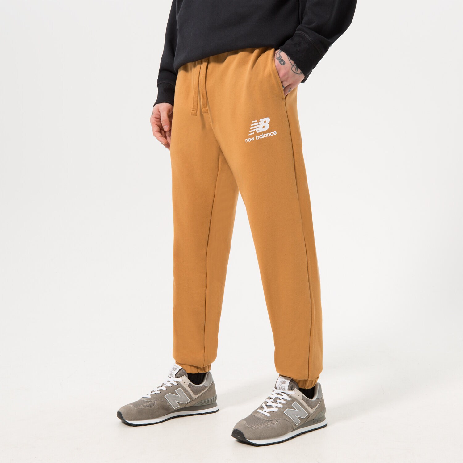 Muške hlače NEW BALANCE HLAČE NB ESSENTIAL STACKED MP31539TOB smeđa