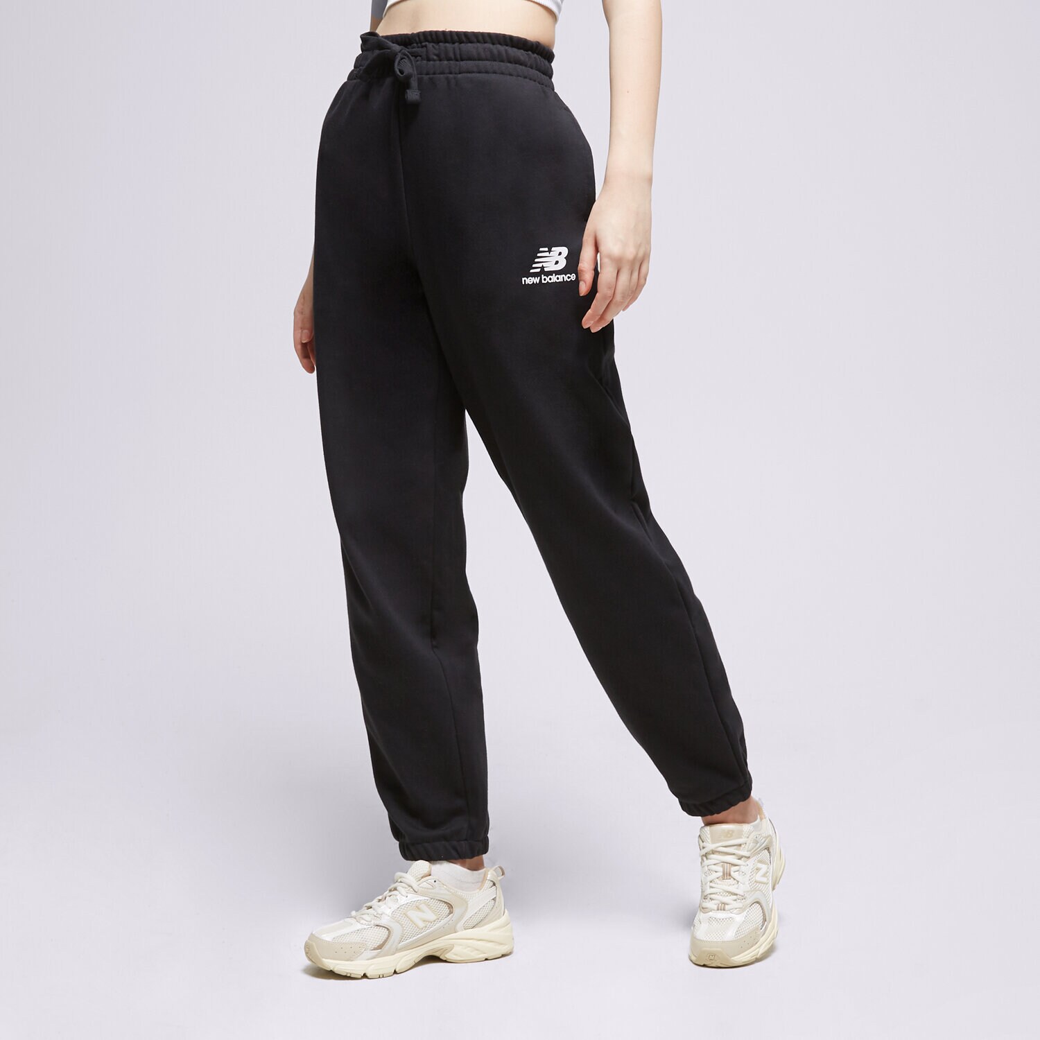 Ženske hlače NEW BALANCE HLAČE NB ESSENTIALS STACKET WP31530BK crna
