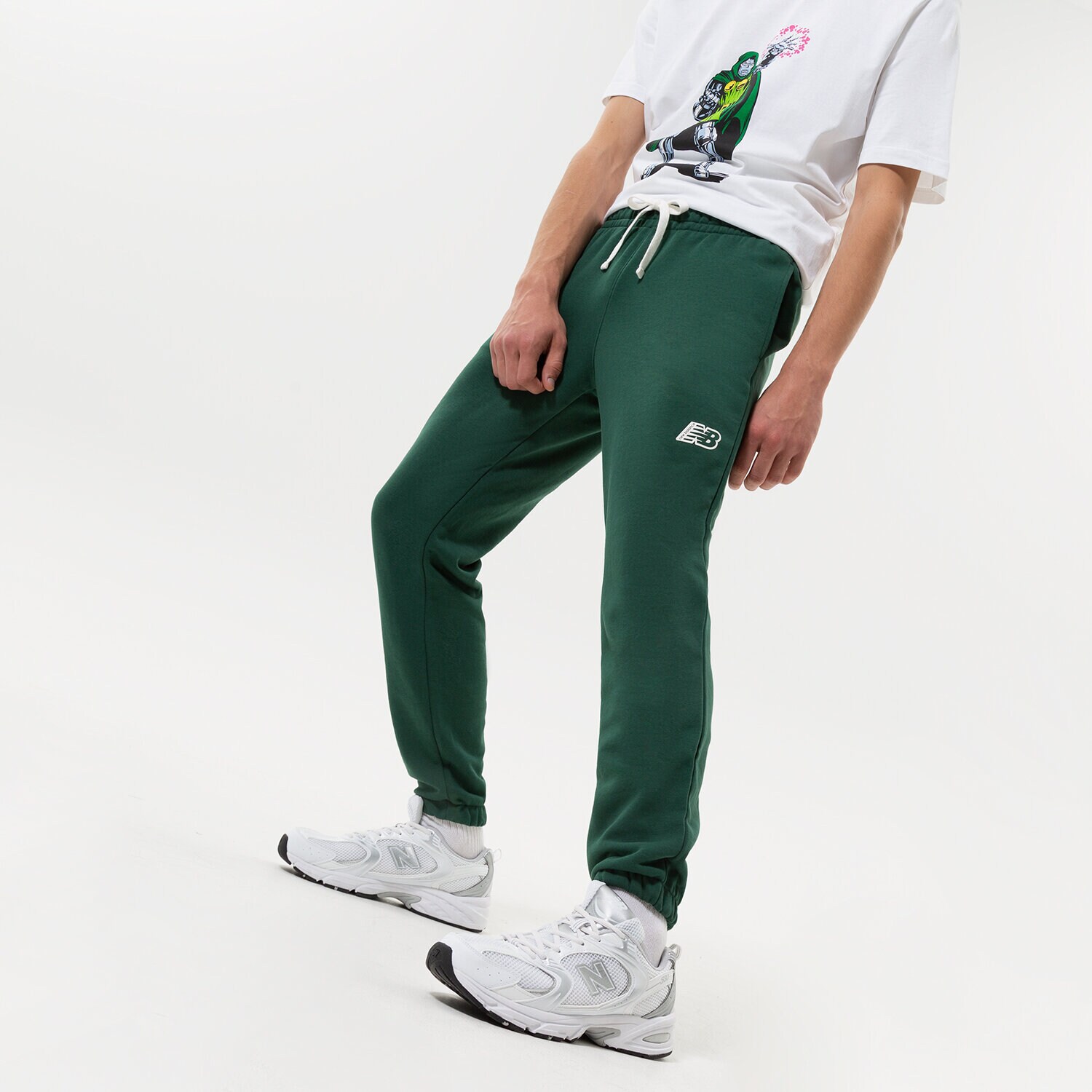 Muške hlače NEW BALANCE HLAČE NB ESSENTIALS FLEECE JOGGER MP23504NWG zelena