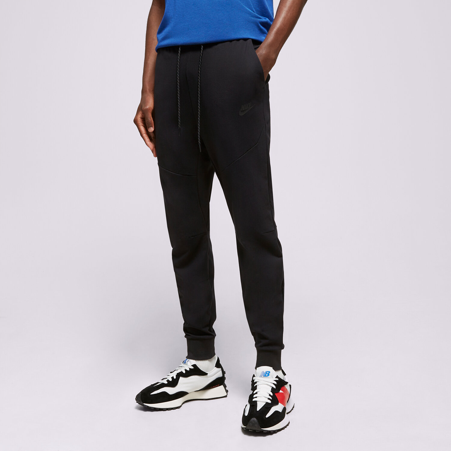 Muške hlače NIKE HLAČE M NK TECH LGHTWHT JGGR DX0826-010 crna