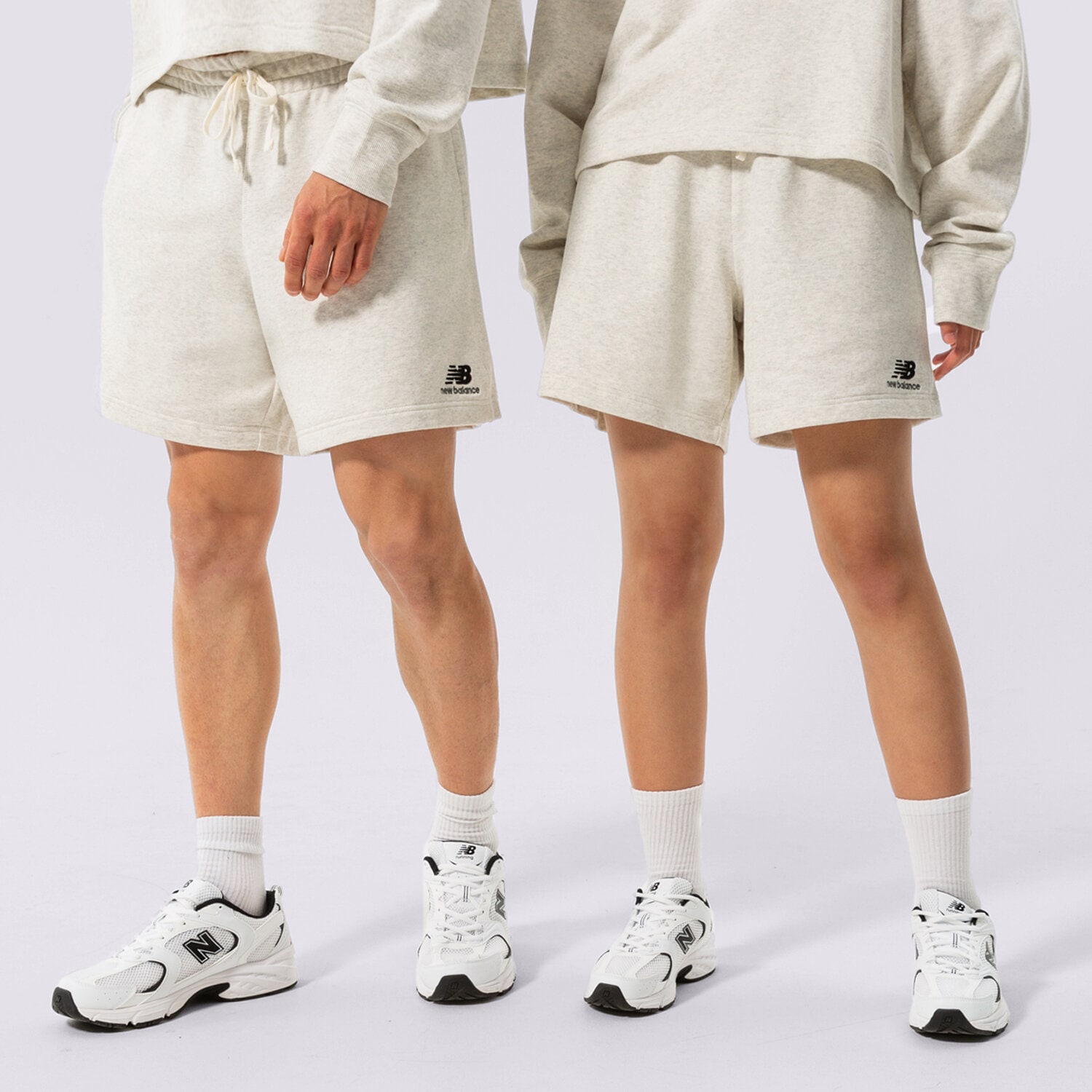 NEW BALANCE KRATKE HLAČE NB ESSENTIALS   UNI-SSENTIALS FLEEC US21500SAH siva
