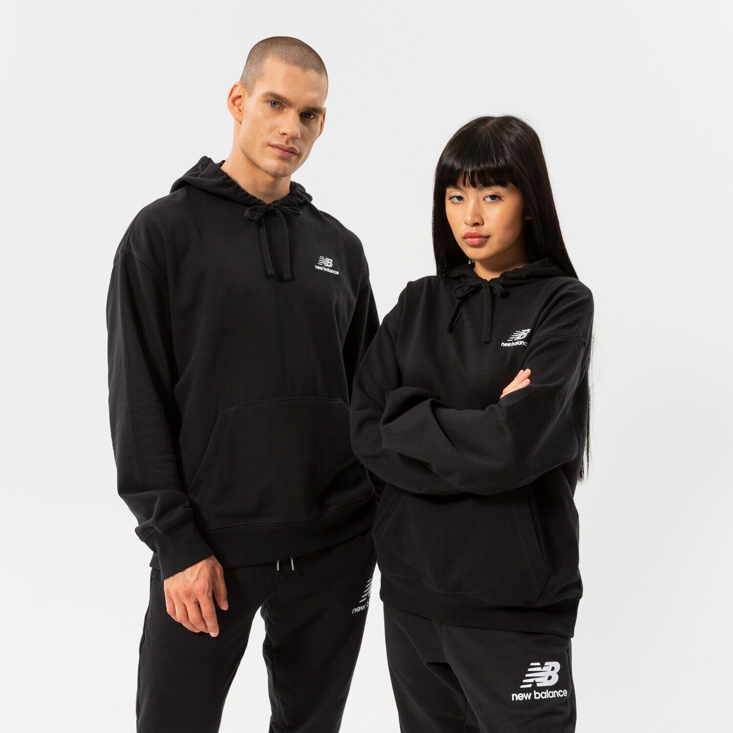 Muške dukserice NEW BALANCE VESTA S KAPULJAČOM NB ESSENTIALS UNI-SSENTIALS P UT21500BK crna