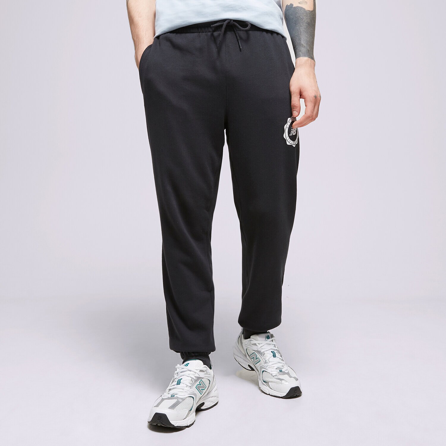Muške hlače NEW BALANCE HLAČE NB SPORT SEASONAL MP31902 crna