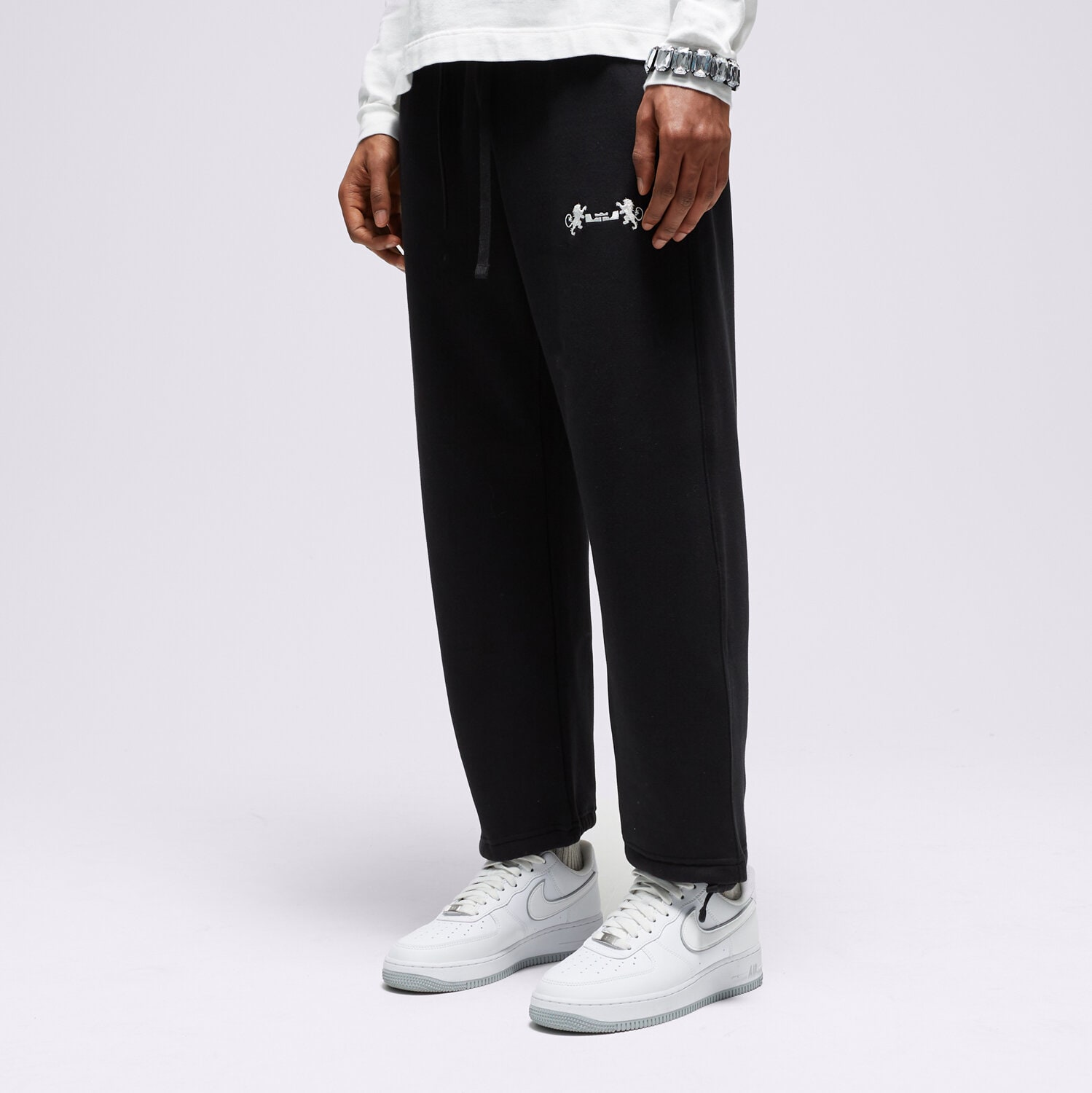 Muške hlače NIKE HLAČE LJ M NK OPEN HEM BRSH FLC PNT NBA FB7127-010 crna