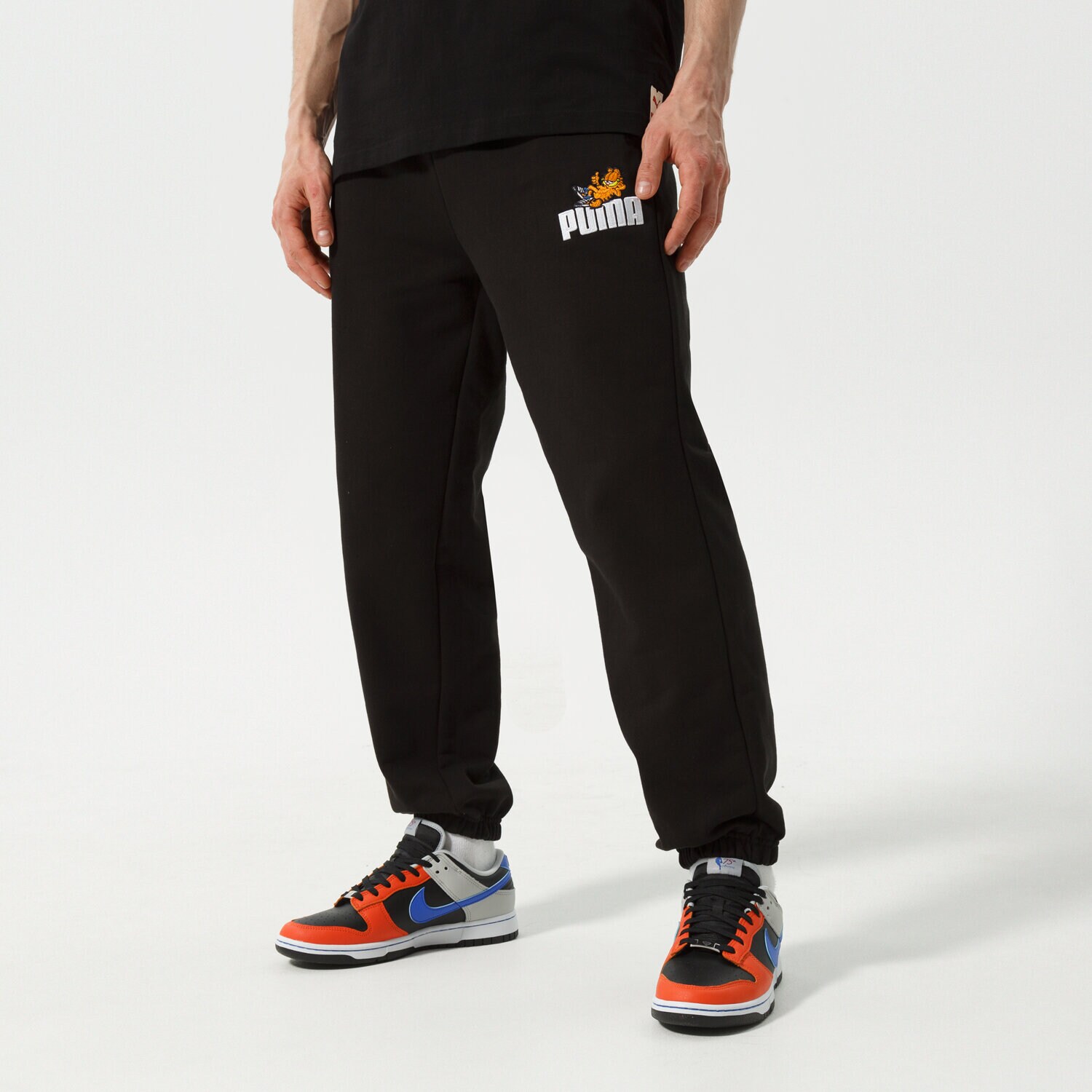 Muške hlače PUMA HLAČE PUMA X GARFIELD SWEATPANTS 534436 01 crna