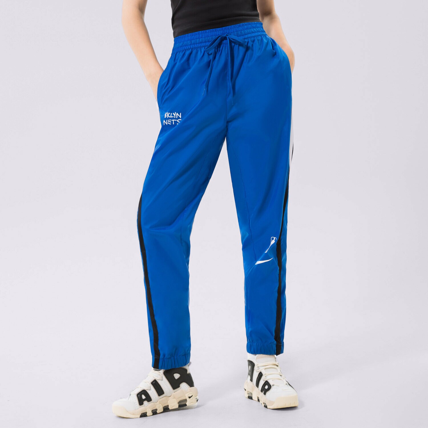 Ženske hlače NIKE HLAČE BKN W NK TRKST PANT CTS CE NBA DO0129-463 plava