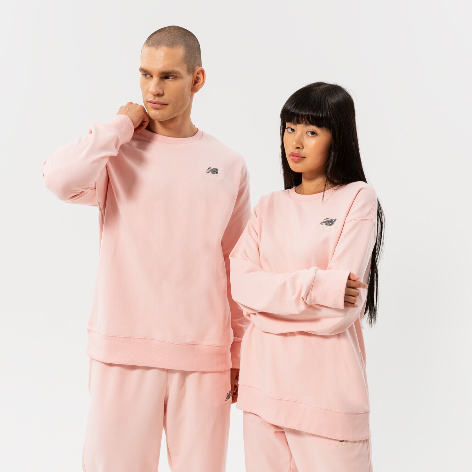 Muške dukserice NEW BALANCE VESTA NB ESSENTIALS UNI-SSENTIALS CREW UT21501PIE ružičasta
