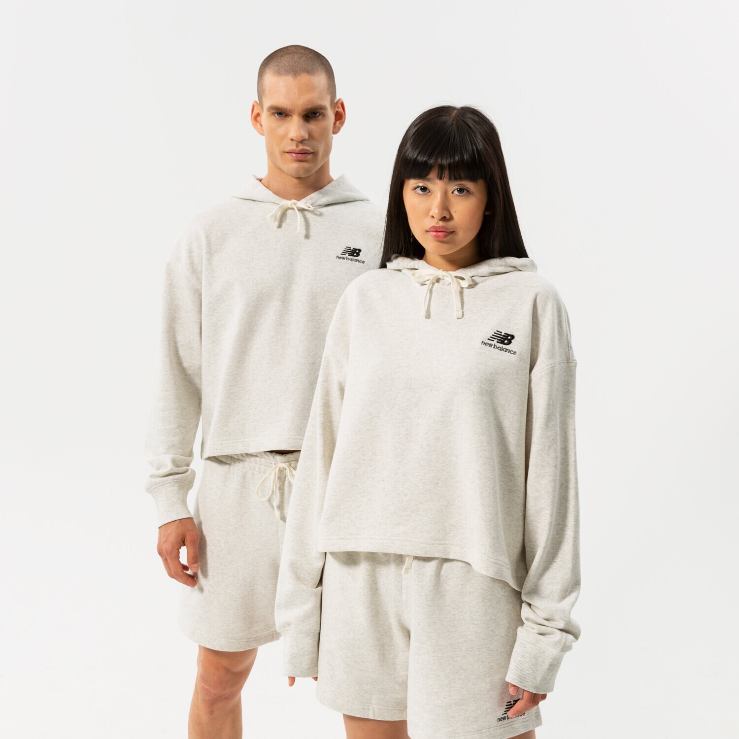 Ženske dukserice NEW BALANCE VESTA S KAPULJAČOM NB ESSENTIALS UNI-SSENTIALS C UT21502SAH siva