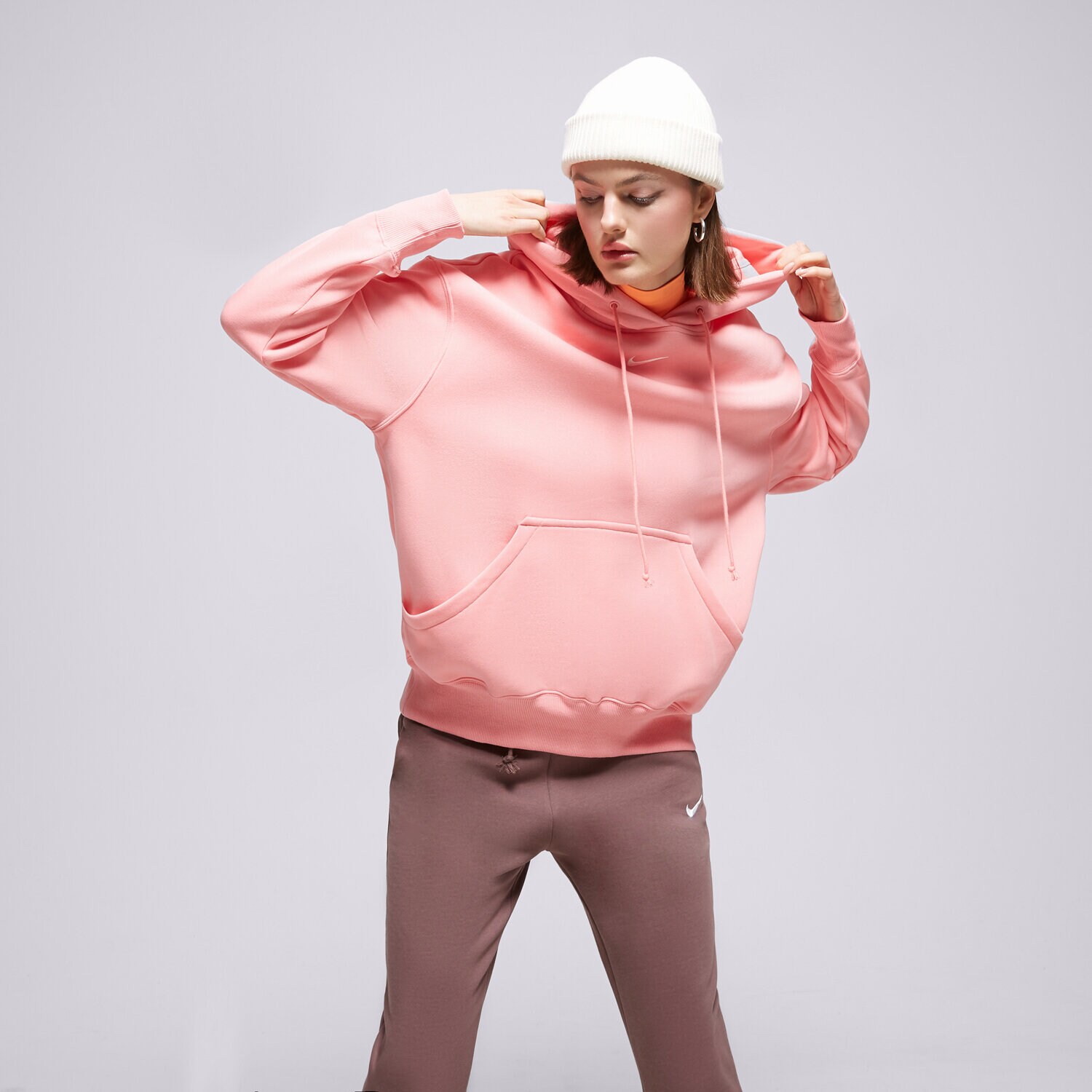 Ženske dukserice NIKE VESTA S KAPULJAČOM W NSW PHNX DQ5860-611 ružičasta