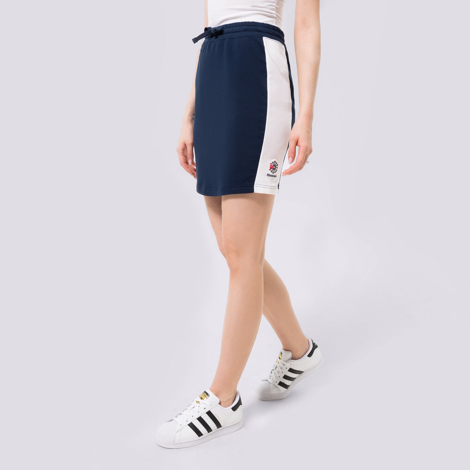 Ženske haljine i suknje REEBOK KRATKA SUKNJA DH1353 DH1353 tamno plava
