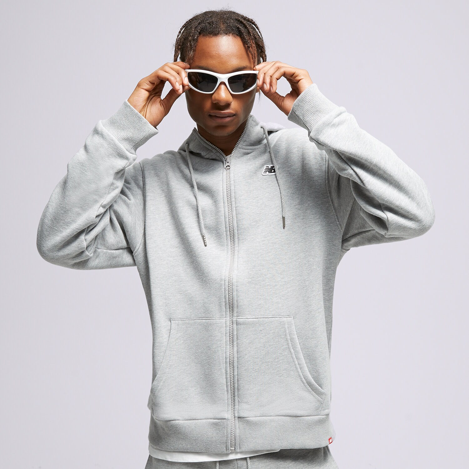 Muške dukserice NEW BALANCE VESTA RASKOPČANA   S KAPULJAČOM ZIP HODIE VESTA MJ23600AG siva